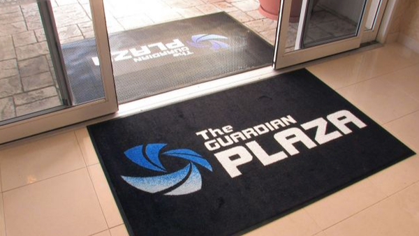 Custom logo mat at doorway