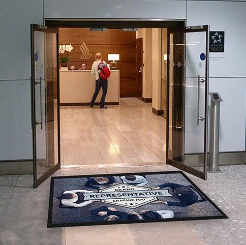 Custom logo mat in doorway