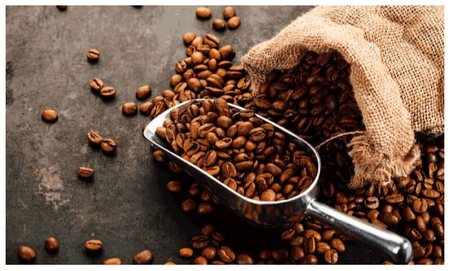 Coffee beans spilling out of bag