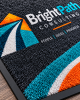 Close-up of Computer Dyed HD Custom Logo Floor Mat surface texture and logo detail