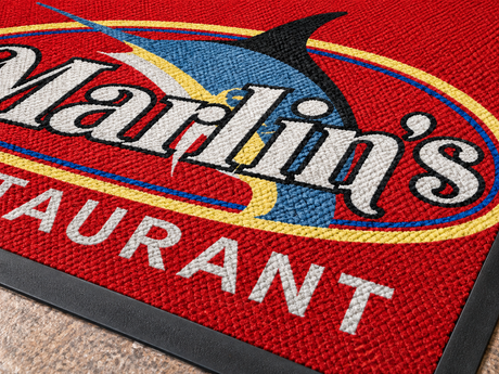 Close-up of Custom Berber Inlay Logo Mat surface texture and logo detail