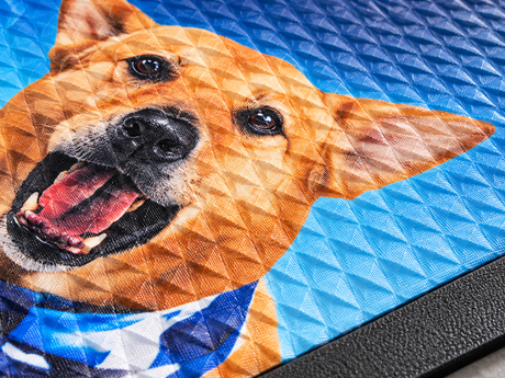 Close-up of Full Color Rubber P.O.P. Custom Logo Mat surface texture and logo detail