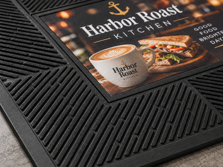 Close-up of POP Scrape Custom Logo Mat surface texture and logo detail