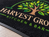 Close-up of Prestige Vinyl Logo Mat surface texture and logo detail